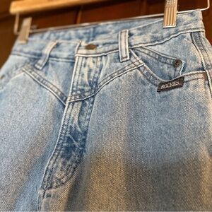 Rockies Authentic Vintage Light Blue Jeans with unique Mountain patch on back.